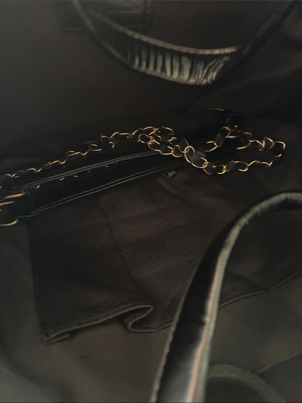 Chic Black Studded Tote with Chain Handles and Gold Accents